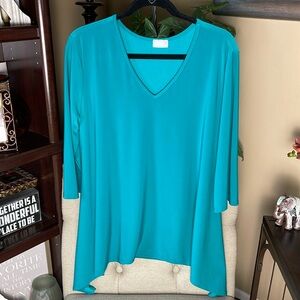 Caribe loose fitting asymmetrical top.